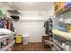 Walk-in closet with shelving, clothes racks, and ample storage space at 2805 Burgos Dr, The Villages, FL 32162