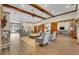 The clubhouse features an inviting seating area with wood floors and large windows at 30532 Gidran Ter, Mount Dora, FL 32757