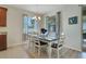 Bright dining area featuring a stylish table and chairs, perfect for Gathering meals at 30532 Gidran Ter, Mount Dora, FL 32757