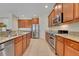 Well-equipped kitchen with ample counter space and stainless steel appliances at 30532 Gidran Ter, Mount Dora, FL 32757
