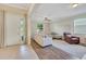 Inviting living room with tile entryway, neutral colors, and plenty of natural light at 30532 Gidran Ter, Mount Dora, FL 32757