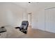 This home office includes a spacious desk, a comfortable chair, and ample closet space at 30532 Gidran Ter, Mount Dora, FL 32757