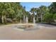 Community splash pad area for with colorful features and refreshing water fountains at 30532 Gidran Ter, Mount Dora, FL 32757
