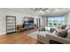 Comfortable living room with large sectional sofa and view of the patio at 313 Blue Cypress Dr, Groveland, FL 34736