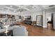 Open-concept living space flowing from the living room, with coffered ceilings, into the kitchen at 313 Blue Cypress Dr, Groveland, FL 34736