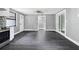 Spacious living room boasts modern flooring, fresh paint, recessed lights, and natural light at 4123 County Road 124, Wildwood, FL 34785