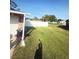 Spacious backyard with lush green grass and privacy fence at 48 Pinehurst Cir, Ormond Beach, FL 32174