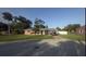 Charming single-story brick home with a well-maintained lawn and mature landscaping at 48 Pinehurst Cir, Ormond Beach, FL 32174