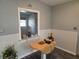 Cozy dining area featuring a pass-through window, perfect for casual meals and conversation at 504 Se 35Th Ave, Ocala, FL 34471