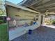 Outdoor kitchen area with sink and workspace, perfect for outdoor cooking and gatherings at 504 Se 35Th Ave, Ocala, FL 34471