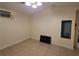 Bare room offering versatility, features tile flooring and a window unit for cooling at 504 Se 35Th Ave, Ocala, FL 34471