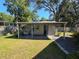 Backyard shed with overhead covering at 504 Se 35Th Ave, Ocala, FL 34471