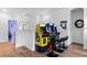 Upstairs entertainment area with classic arcade games and seating at 5241 Oakbourne Ave, Davenport, FL 33837