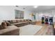 Recreation area with sectional sofa, decorative wall art, and classic arcade games at 5241 Oakbourne Ave, Davenport, FL 33837