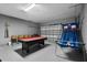 Game room with a pool table, basketball game, and durable flooring at 5241 Oakbourne Ave, Davenport, FL 33837