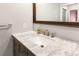 Bathroom with stylish marble countertop vanity, stainless steel faucet and fixtures, and recessed lighting at 5380 County Road 122, Wildwood, FL 34785