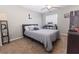 Neutral bedroom with carpet, ceiling fan and modern decorations at 5437 Compass Pt # 00, Oxford, FL 34484