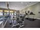 A modern fitness center equipped with treadmills, weight machines, and free weights at 5437 Compass Pt # 00, Oxford, FL 34484