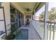Enjoy the fresh air on this screened patio with comfortable seating and a scenic view at 5437 Compass Pt # 00, Oxford, FL 34484
