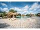 Beautiful pool with rock waterfall and clear water offers luxurious relaxation at 5437 Compass Pt # 00, Oxford, FL 34484