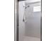 Clean white-tiled shower with updated fixture at 5437 Compass Pt # 00, Oxford, FL 34484