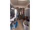 Spacious walk-in closet with ample storage for clothing and shoes at 5437 Compass Pt # 00, Oxford, FL 34484
