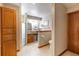 Bathroom featuring a wooden vanity, shower, and a toilet at 5521 Oak St, Mount Dora, FL 32757