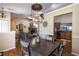 Open-concept dining area with a view of the fireplace and kitchen at 5521 Oak St, Mount Dora, FL 32757