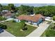 Charming single-story house with well-kept lawn and long driveway at 5521 Oak St, Mount Dora, FL 32757