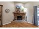 Living room fireplace with stone surround and a decorative mantel, set on wood laminate flooring at 5521 Oak St, Mount Dora, FL 32757