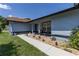 Charming home featuring well manicured landscaping and attractive walkway at 5521 Oak St, Mount Dora, FL 32757