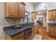 This kitchen is equipped with sleek countertops, and wooden cabinetry at 5521 Oak St, Mount Dora, FL 32757