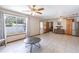 Open floorplan with tile flooring, neutral walls, and stainless steel appliances at 5521 Oak St, Mount Dora, FL 32757