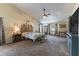 Spacious main bedroom features vaulted ceilings, carpet, and ample natural light at 5521 Oak St, Mount Dora, FL 32757