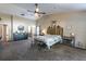 Large main bedroom offers vaulted ceilings, carpet, and ample space at 5521 Oak St, Mount Dora, FL 32757