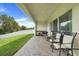 This home has a lovely covered patio with brick flooring and plenty of room for seating and a grill at 641 Black Eagle Dr, Groveland, FL 34736