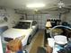 Spacious two-car garage featuring ample storage space at 751 Old Oaks Ln, Leesburg, FL 34748