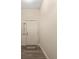 Bright entryway featuring a white door with sidelight, neutral walls and wood-look floors at 832 Parrish Pl, The Villages, FL 32163