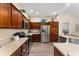 Bright kitchen featuring stainless steel appliances, plenty of cabinet storage, and an open layout at 832 Parrish Pl, The Villages, FL 32163
