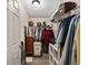 Organized walk-in closet with shelves, hanging racks, and storage options to maximize space and convenience at 832 Parrish Pl, The Villages, FL 32163
