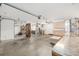 Spacious garage with ample storage and work area at 9059 Se 177Th Grassmere St, The Villages, FL 32162