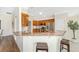 Updated kitchen features granite counters and stainless appliances at 9059 Se 177Th Grassmere St, The Villages, FL 32162