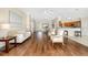 Spacious living room with hard wood floors leads to dining area and kitchen at 9059 Se 177Th Grassmere St, The Villages, FL 32162
