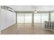 Comfortable patio features mini-split A/C and full window coverings at 9059 Se 177Th Grassmere St, The Villages, FL 32162