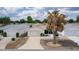 Picture of a well-manicured lawn and charming home in an attractive neighborhood at 9321 Se 172Nd Augusta Ln, The Villages, FL 32162