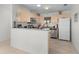 Well-maintained kitchen features modern appliances, tiled floors, and ample counter space at 9321 Se 172Nd Augusta Ln, The Villages, FL 32162