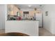 Well-maintained kitchen features modern appliances, tiled floors, and ample counter space at 9321 Se 172Nd Augusta Ln, The Villages, FL 32162