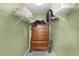 Walk-in closet with shelving, clothes, and a dresser at 9321 Se 172Nd Augusta Ln, The Villages, FL 32162