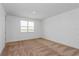 Serene bedroom with natural light and neutral carpeting, offering a peaceful retreat at 9674 Rodbell St, Orlando, FL 32827