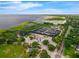 Aerial view showcasing waterfront marina, restaurant amenities, parking, boat ramp, and access to the open water at 101 Lakeshore Blvd, St Cloud, FL 34769
